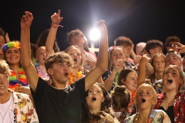 Students cheering on their team.