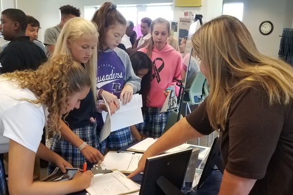 Students signing up for clubs.